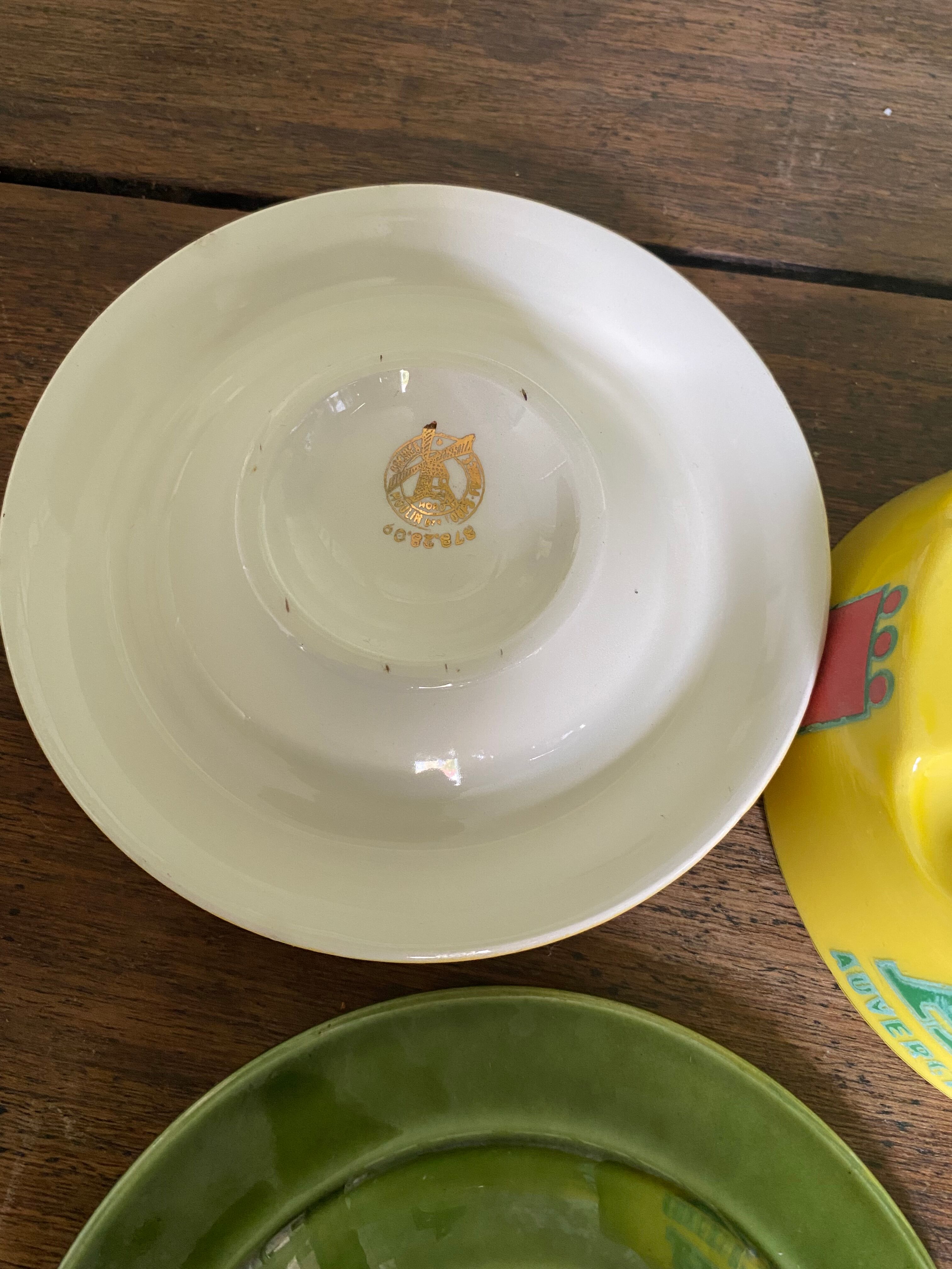 Trio of bistro ashtrays, early twentieth sit