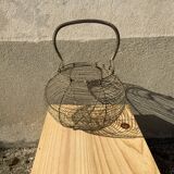 Vintage iron egg basket with hanse antique