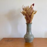 Glazed stoneware based, signed.