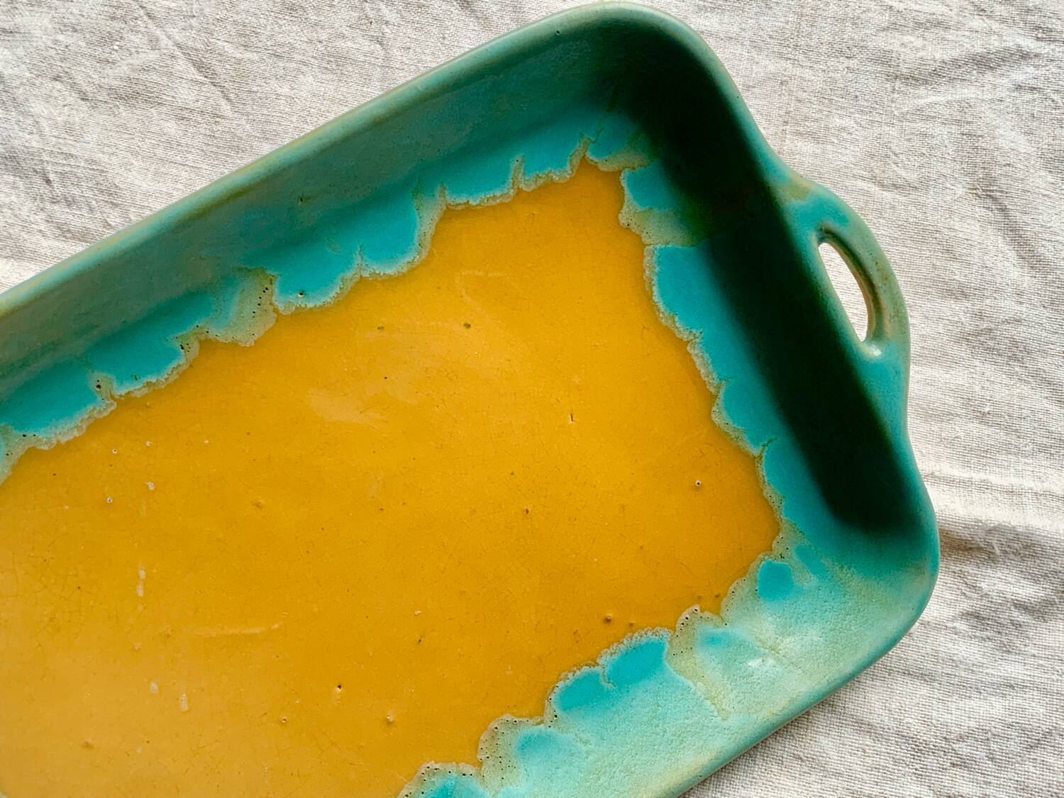 CAB turquoise and ochre ceramic dish with handles