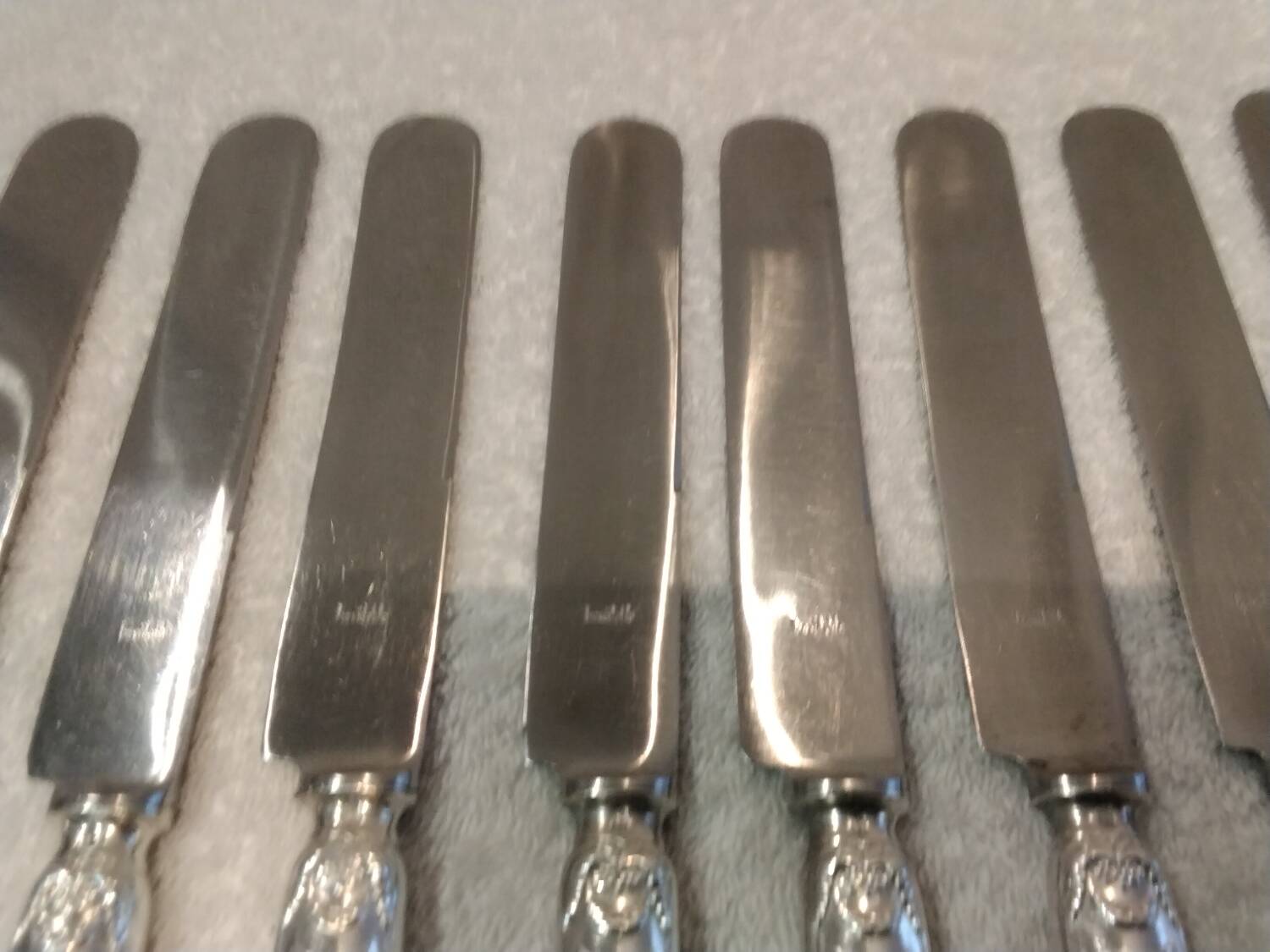 10 silver-plated dessert knives, Empire style, French work?