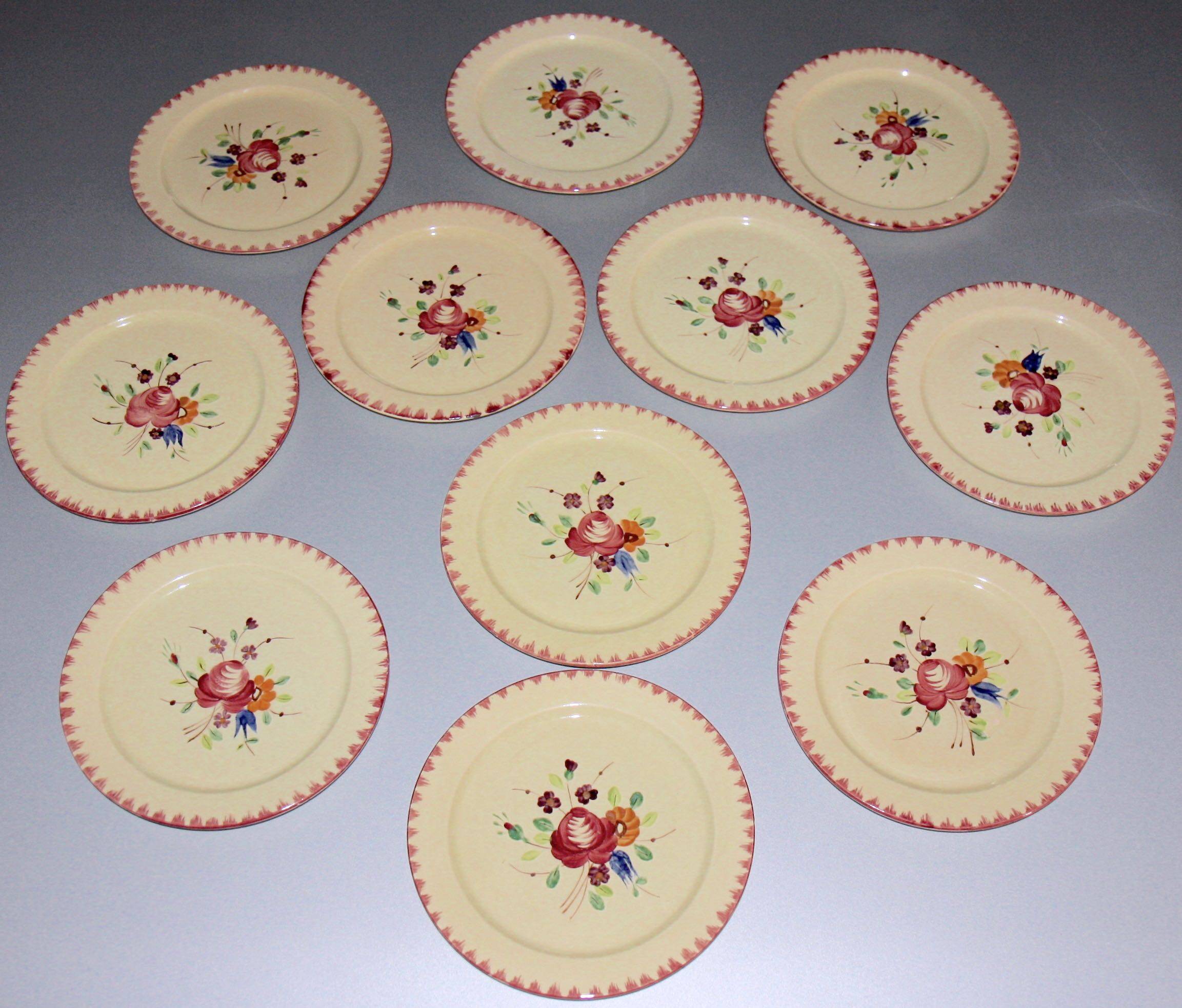 Eleven vintage plates in fine earthenware from Longchamp, Padua model.