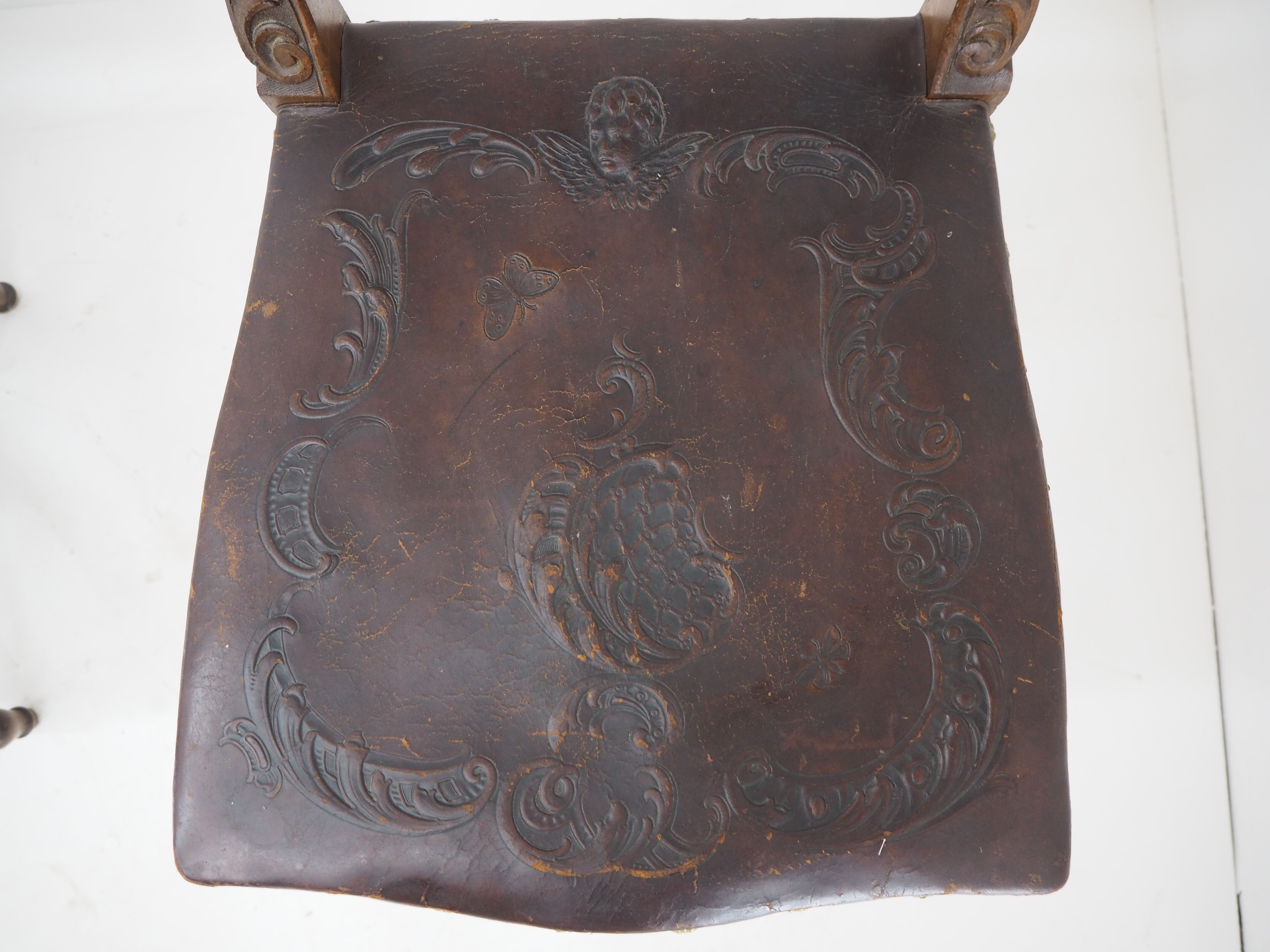 Pair of Antique Embossed Leather Chairs