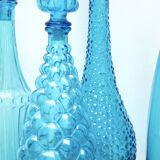 Set of four Italian blue glass carafes, 1960s