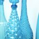 Set of four Italian blue glass carafes, 1960s