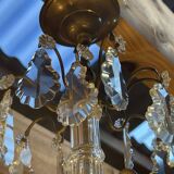 Three-light chandelier in bronze and cut crystal, early 20th century work.