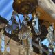 Three-light chandelier in bronze and cut crystal, early 20th century work.