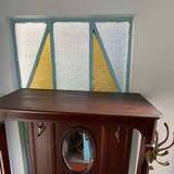 Antique wooden coat rack with mirror and shelf.