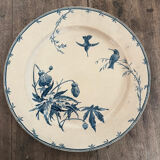 Round serving dish model Birds Mouches of the earthenware factory of Gien.