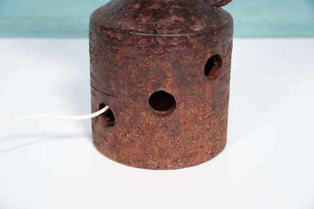 Vintage ceramic table lamp with a space age or bold look, fat lava ceramic from the 1960s.