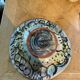 Plate snake contemporary artist