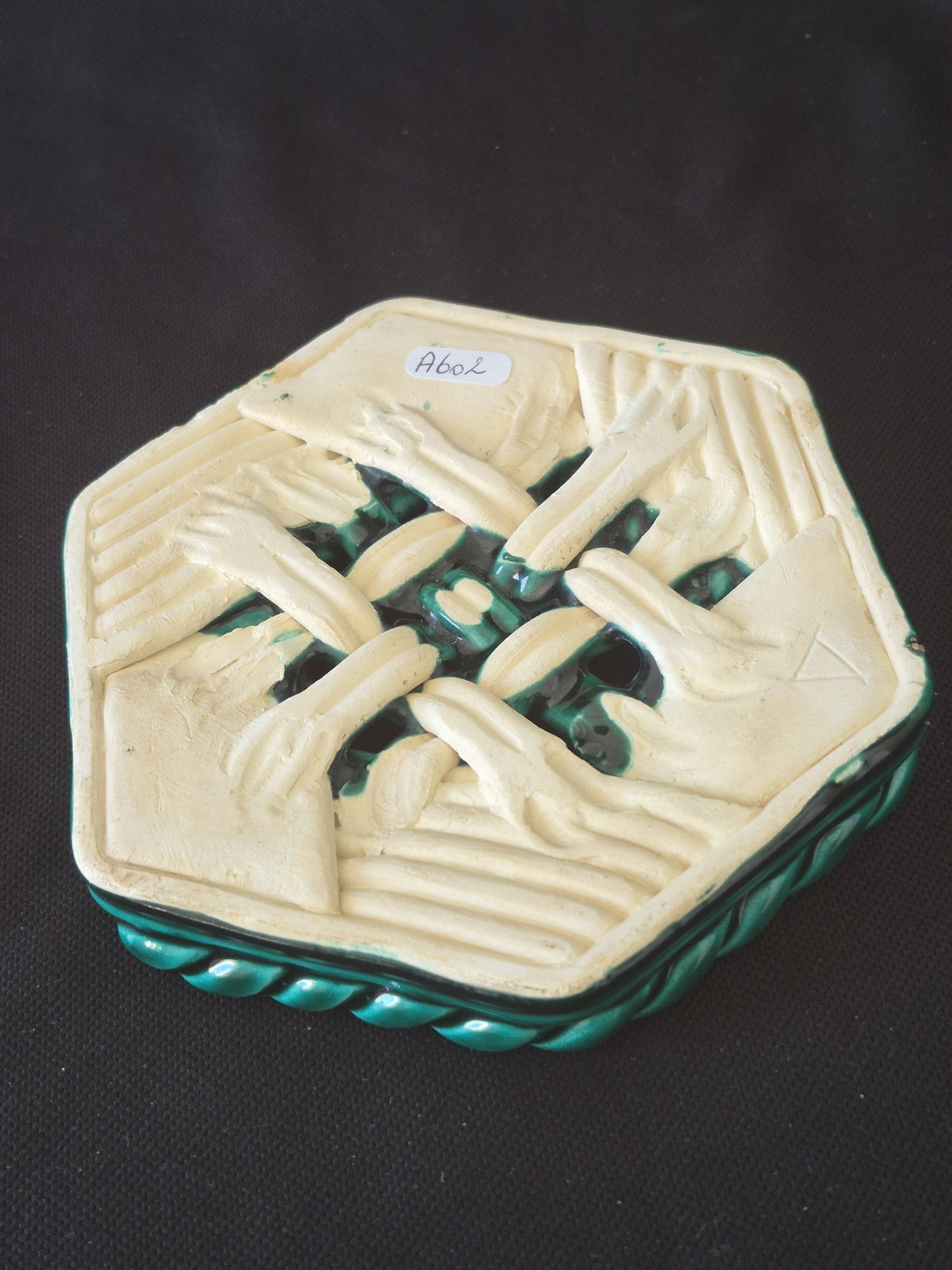 Varnished ceramic trivet from Vallauris and 2 bottle coasters.