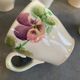 10 slipware cups, pansies