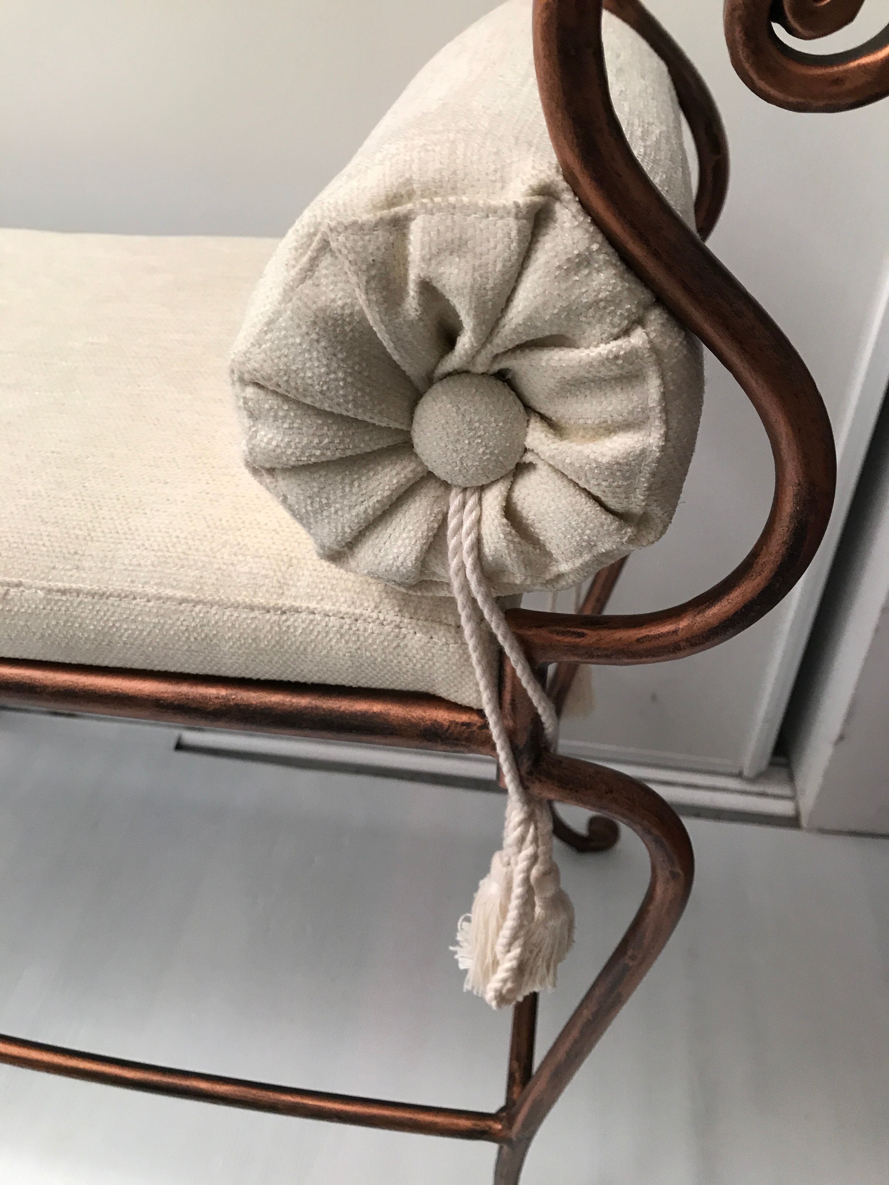 Copper wrought iron bench with cushions