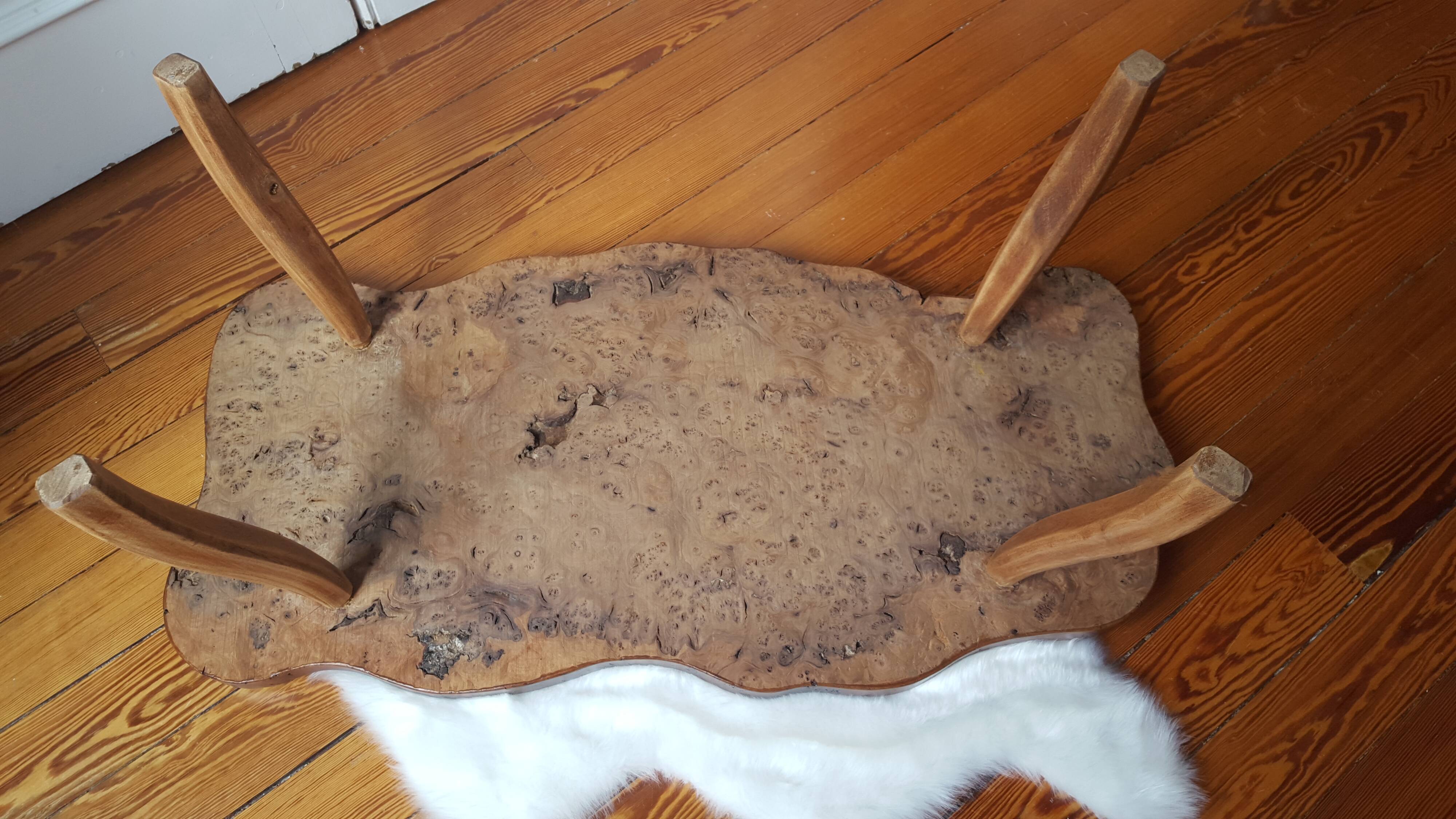 Table low 70s in solid wood tree trunk