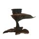 Patinated green brass candlestick with foliage decoration.