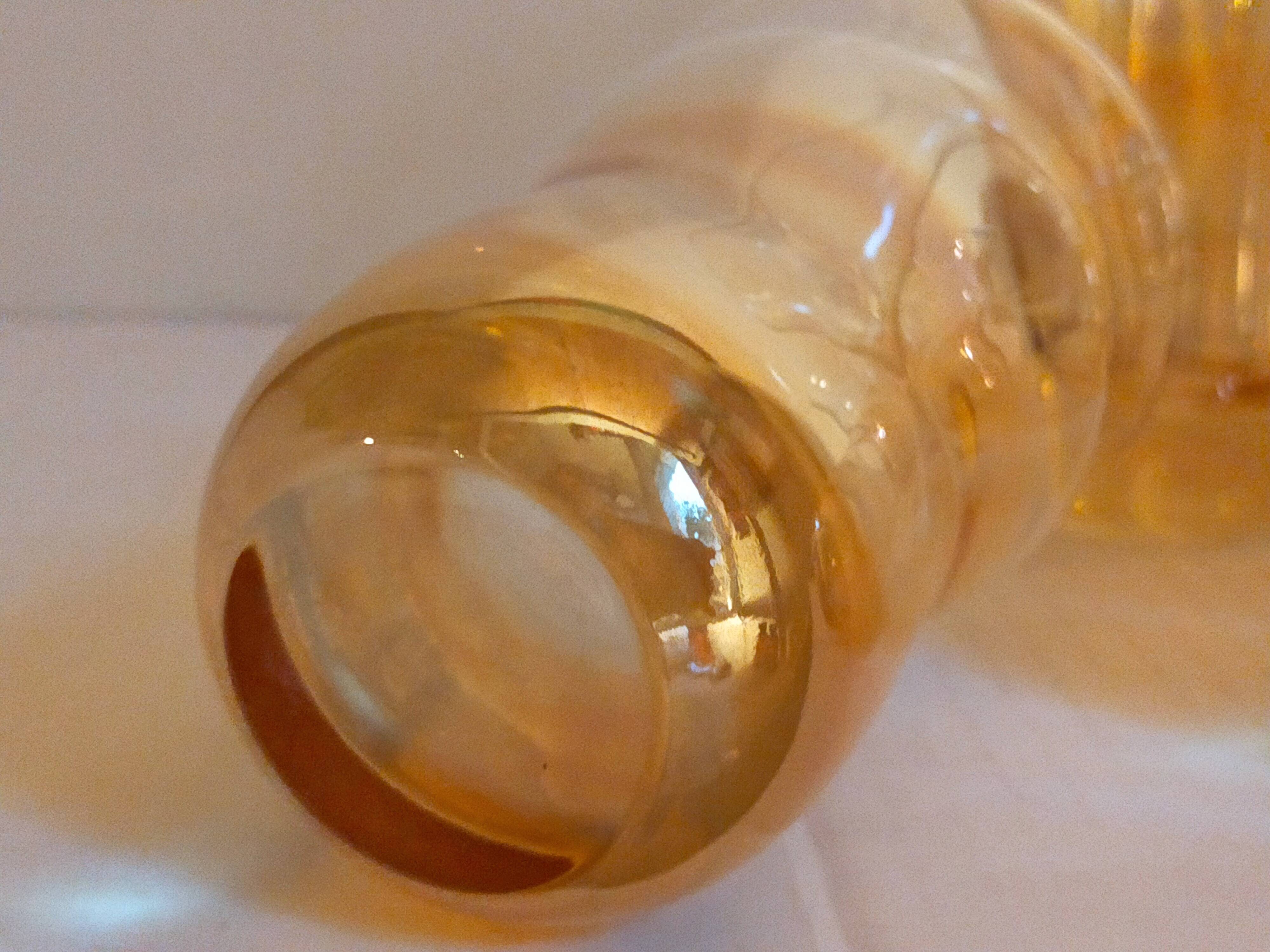 Four iridescent honey blown glass glasses