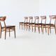 Set of six Danish dining chairs in teak and faux leather Denmark 1960