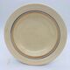 6 deep plates with fine blue and brown rim decorations.