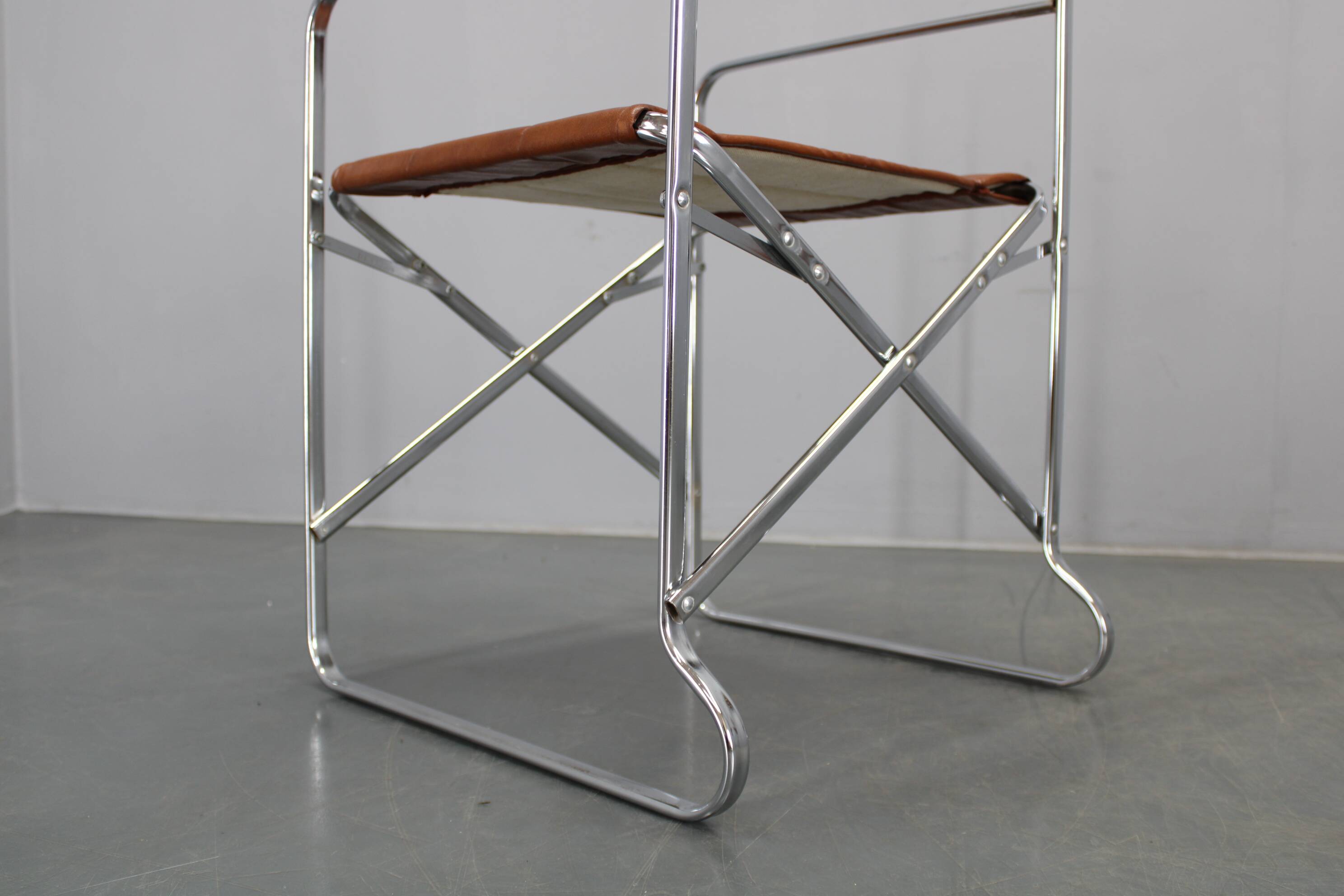 1970s pair of Italian folding chairs with leatherette upholstery