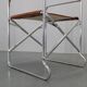 1970s pair of Italian folding chairs with leatherette upholstery
