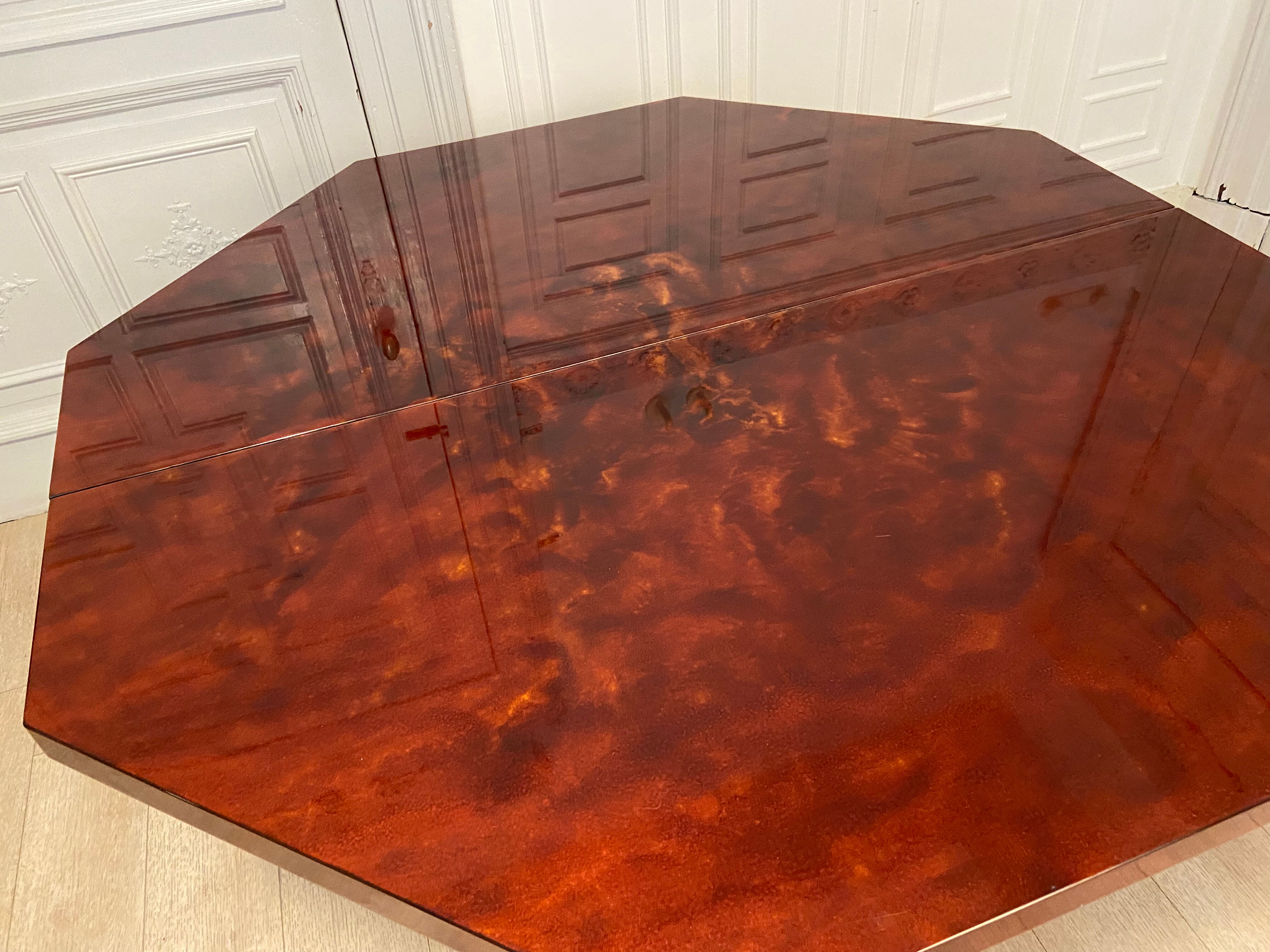 Red lacquered dining table and gold dust, 1970s