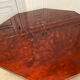 Red lacquered dining table and gold dust, 1970s