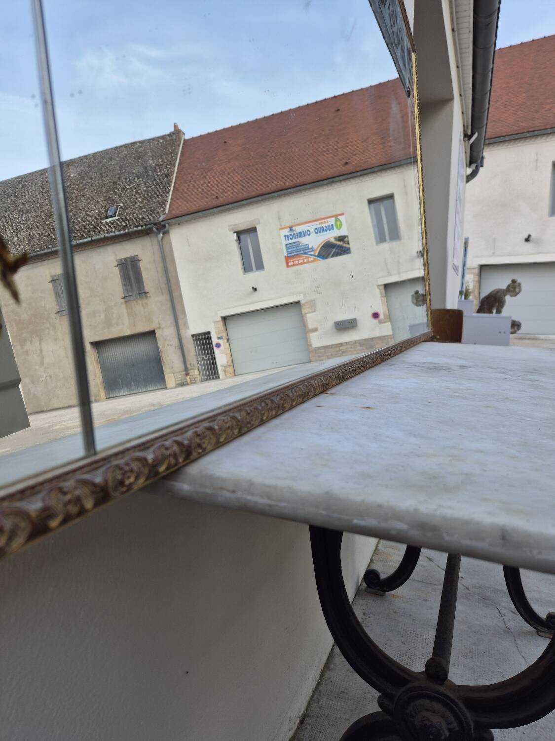 Antique gilded Venetian brasserie mirror in eglomised glass