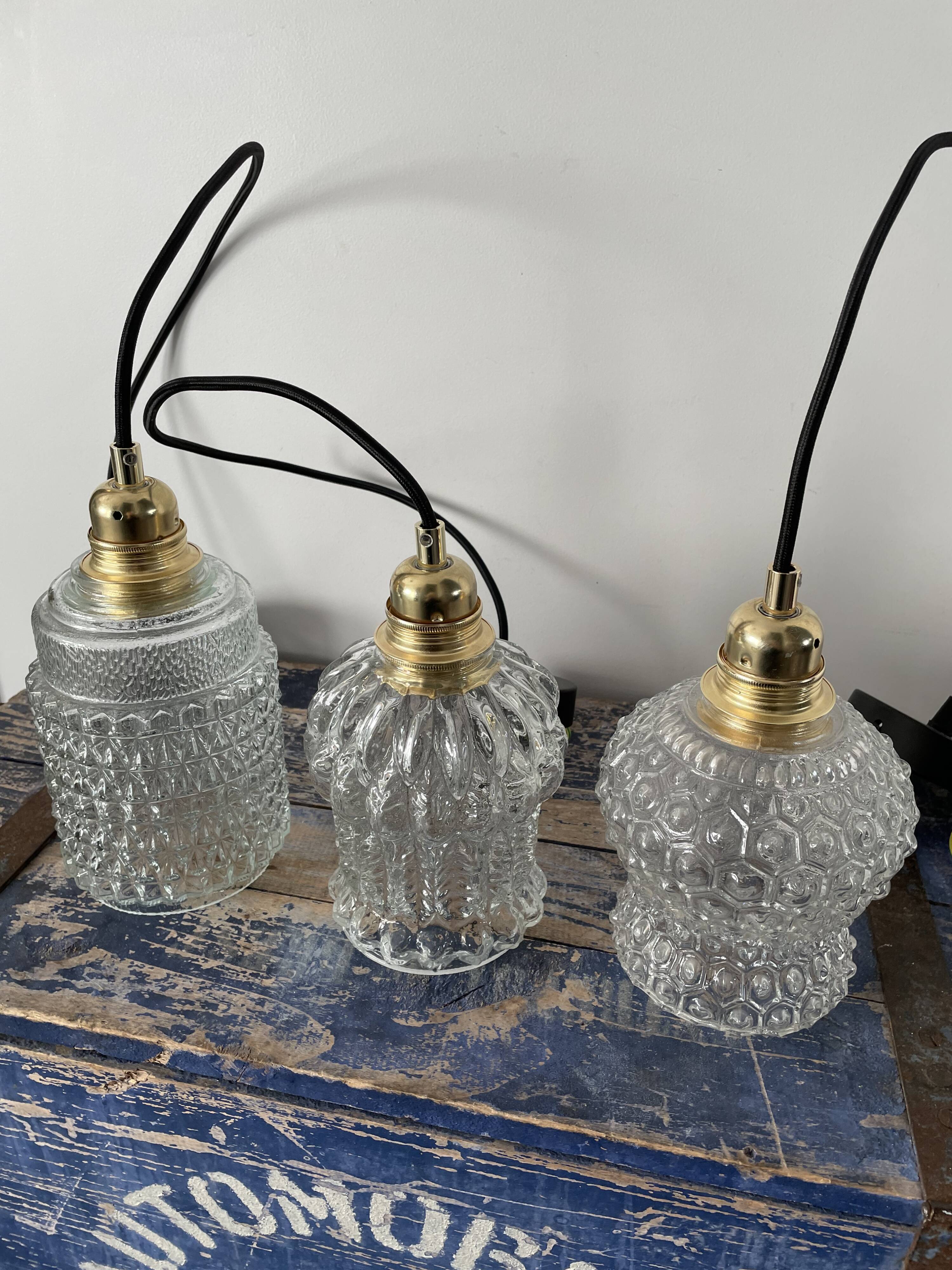 Set of three vintage electrified glass pendant lamps