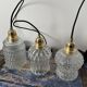 Set of three vintage electrified glass pendant lamps