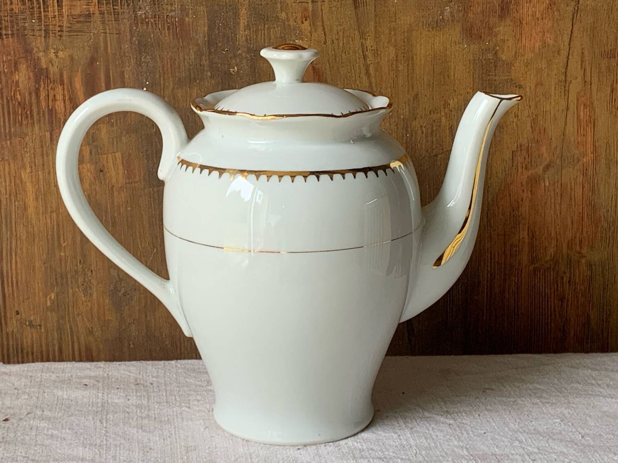 Antique porcelain jug with Limoges enamel