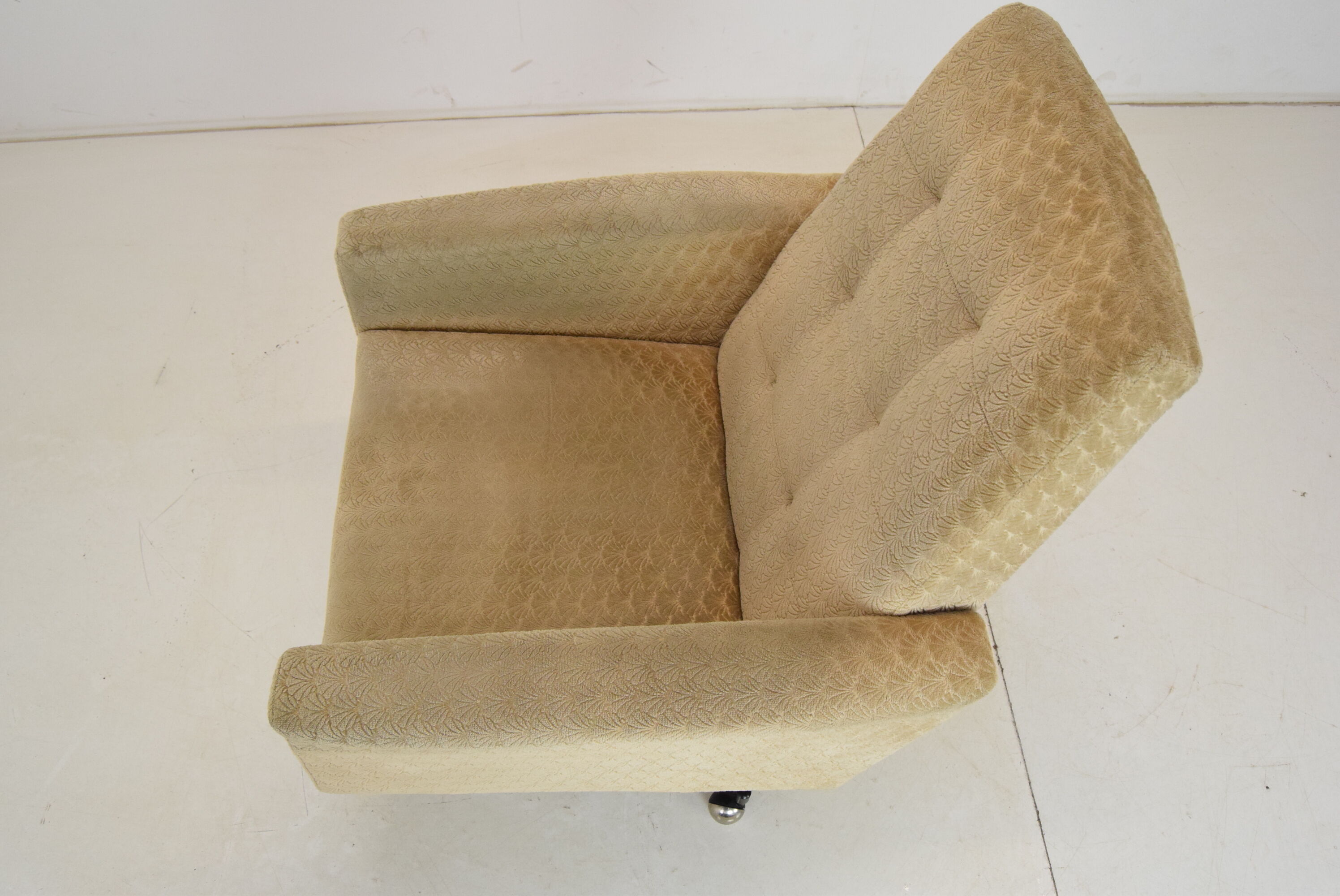 Mid-century swivel armchair with wheels 1970's