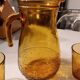 Italian pitcher service and 6 amber glasses