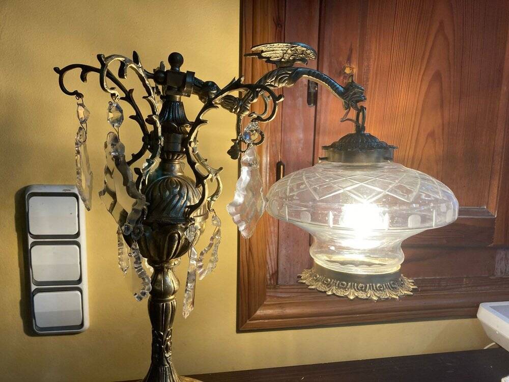 Bronze table lamp with dragon arm and cut glass shade, 1940s