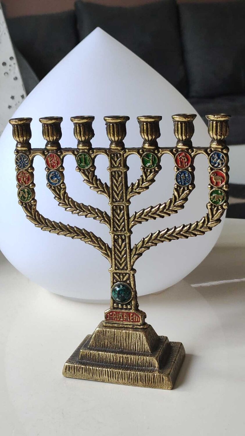 Menorah/Hebrew Candlestick with 7 branches. Astrological signs. Hanukkah. In patinated brass old gold