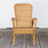 Rattan armchair with reclining backrest
