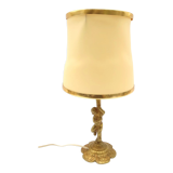 Lampe à poser cherubin en laiton.