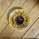 Yellow ceramic plate by Georges Jouve
