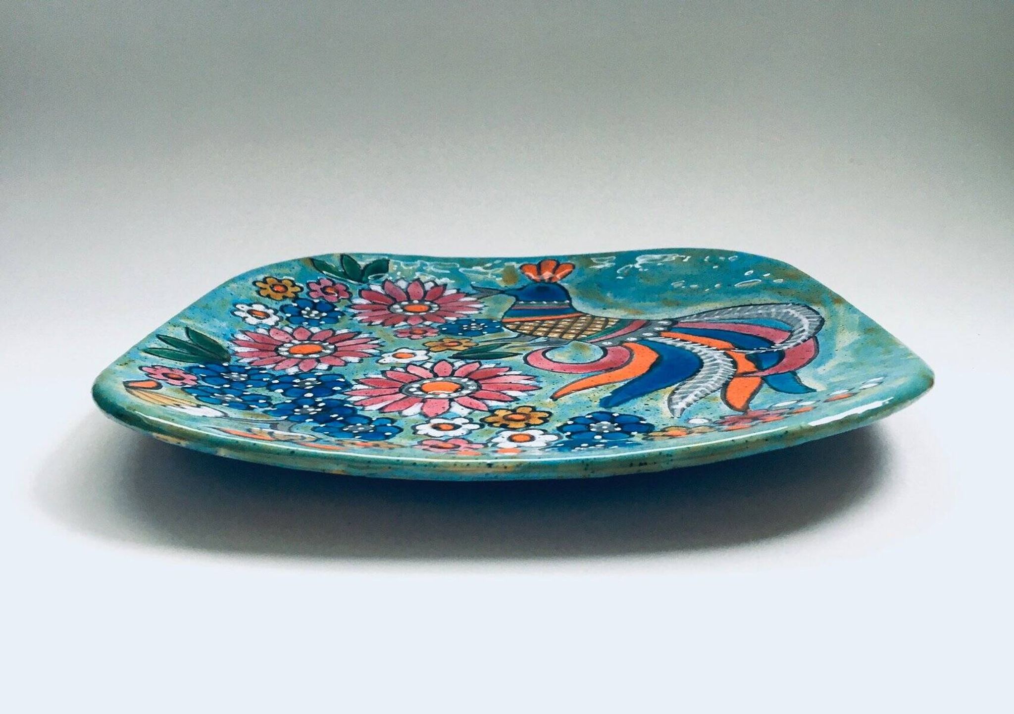 French hand-painted art pottery charger dish by Marjatta Taburet, Quimper, 1960s.