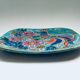 French hand-painted art pottery charger dish by Marjatta Taburet, Quimper, 1960s.