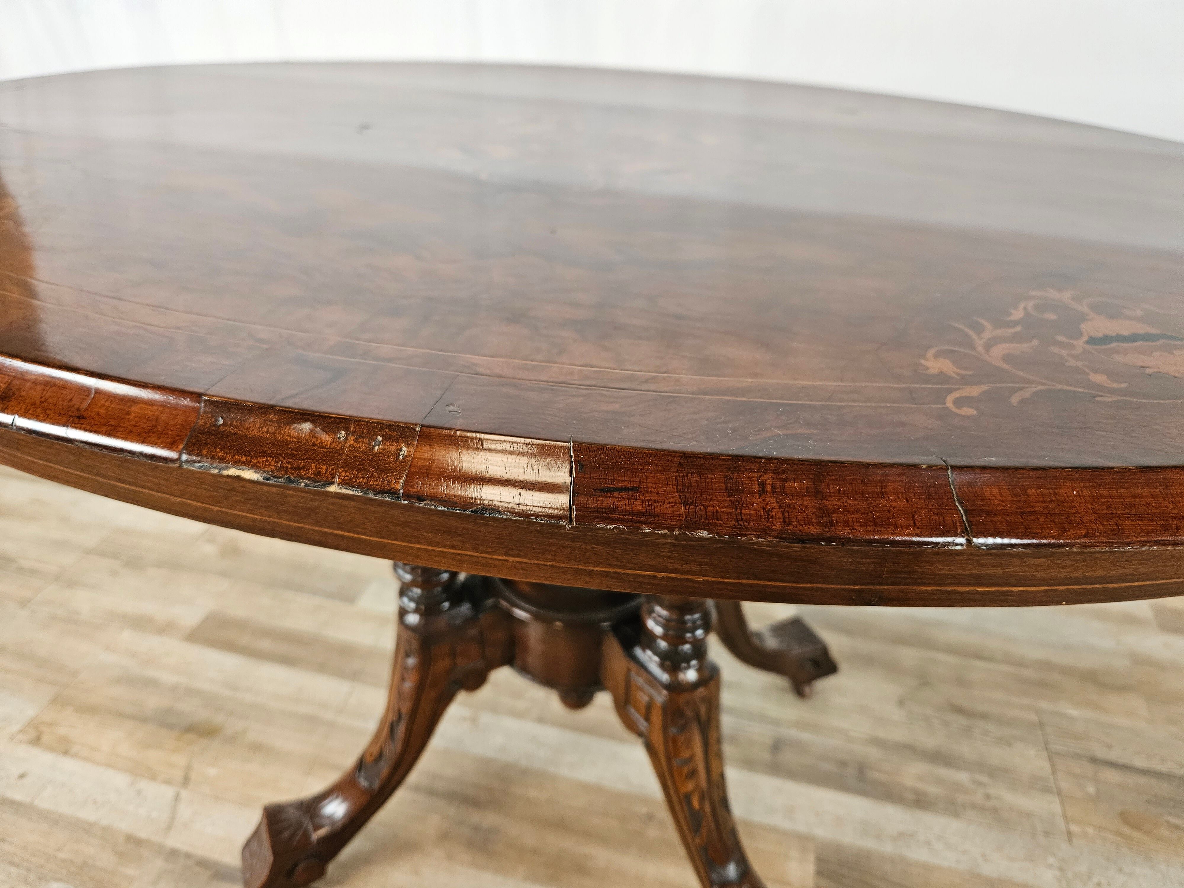 Coffee table in walnut with maple inlays and wheels