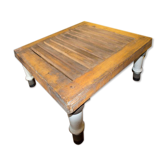 Industrial table with porcelain legs