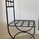 Six wrought iron chairs