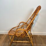 Pair of designer armchairs in rattan