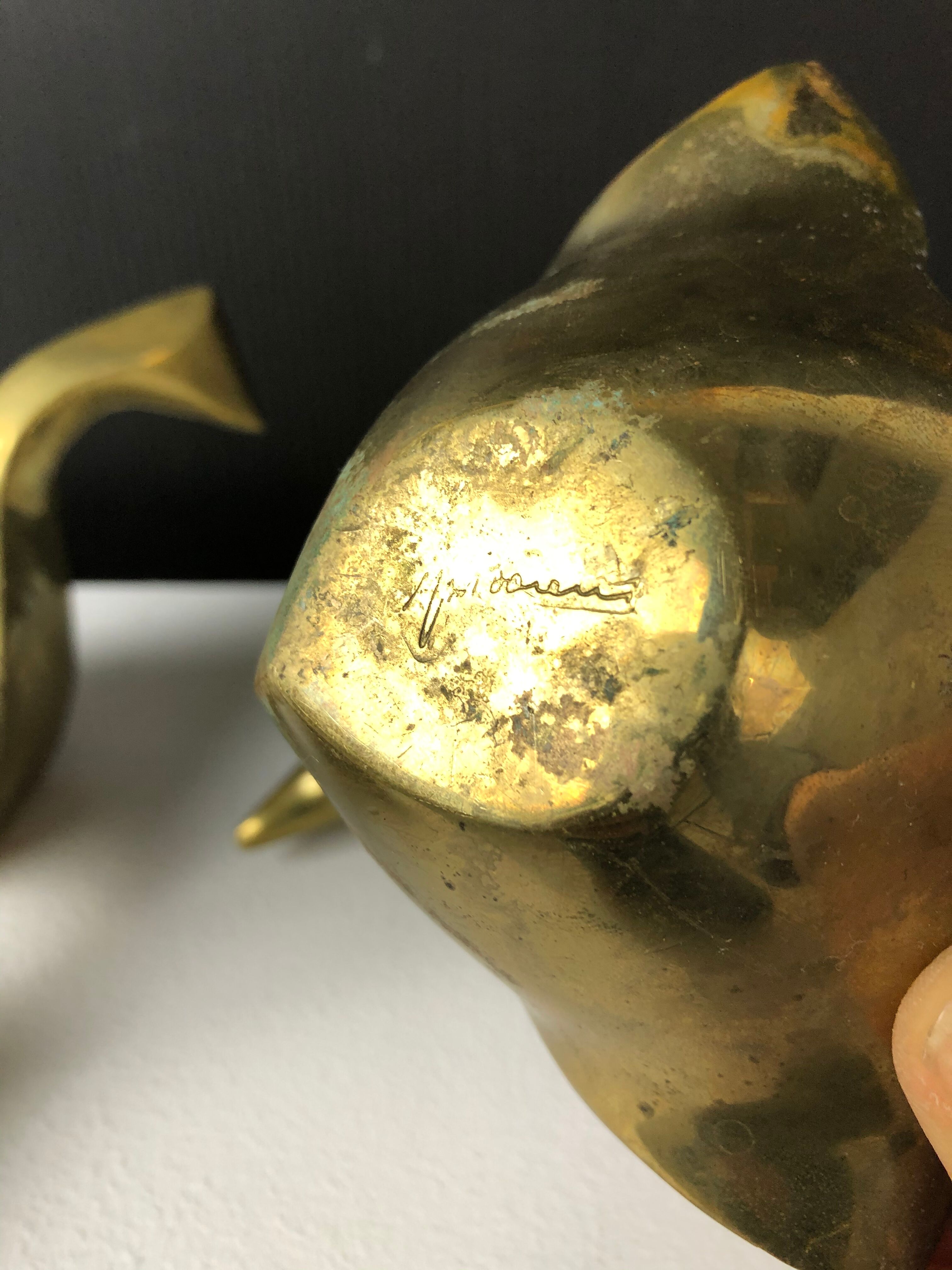 Suite of bronze "swan" ashtrays