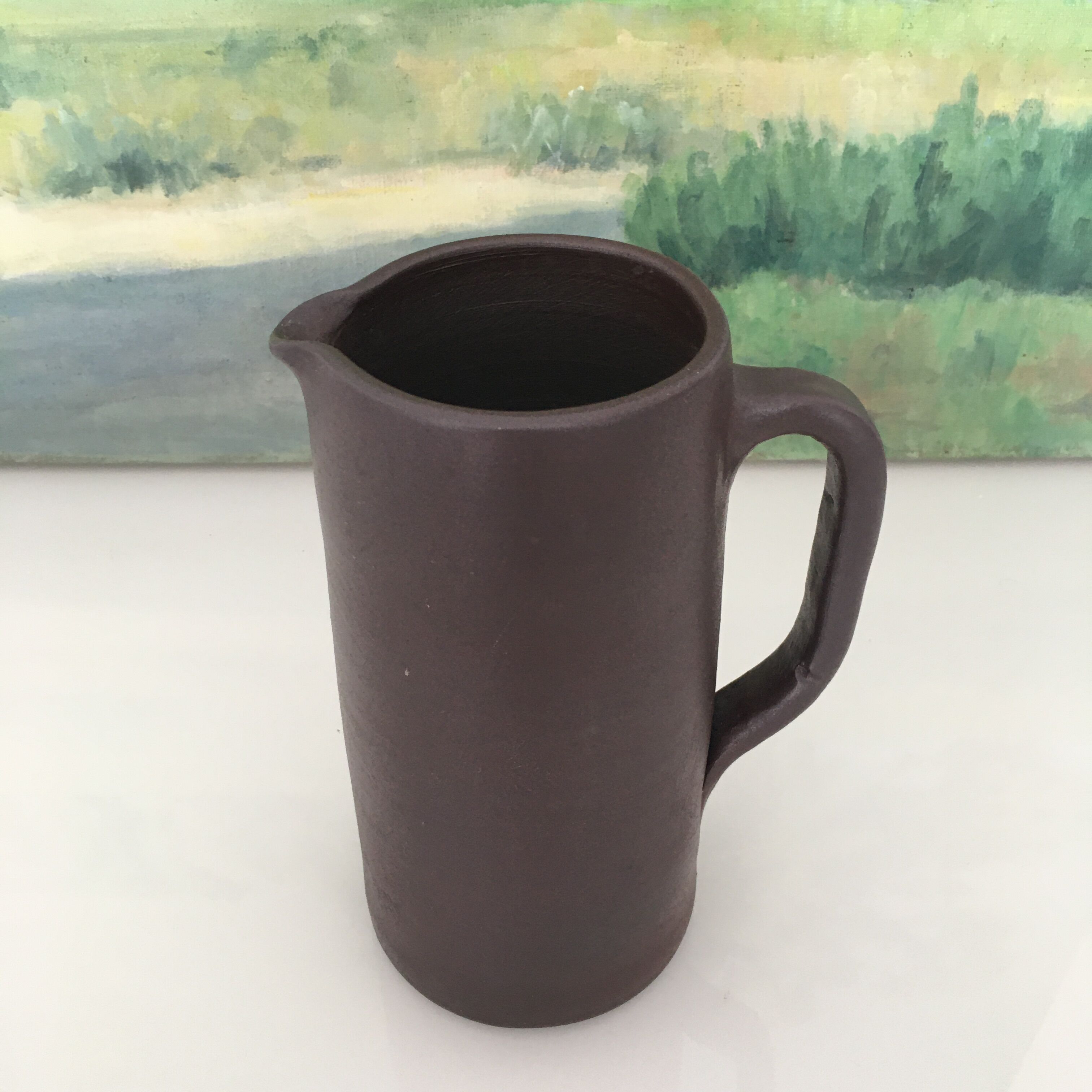 Dark brown sandstone pitcher