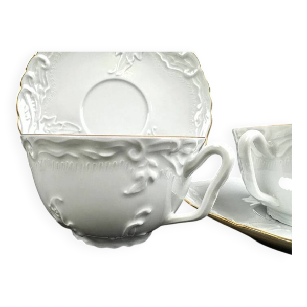 Tasses et soucoupes Tharaud Limoges porcelaine blanche relief doré