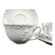 Tharaud Limoges white porcelain cups and saucers with gold relief