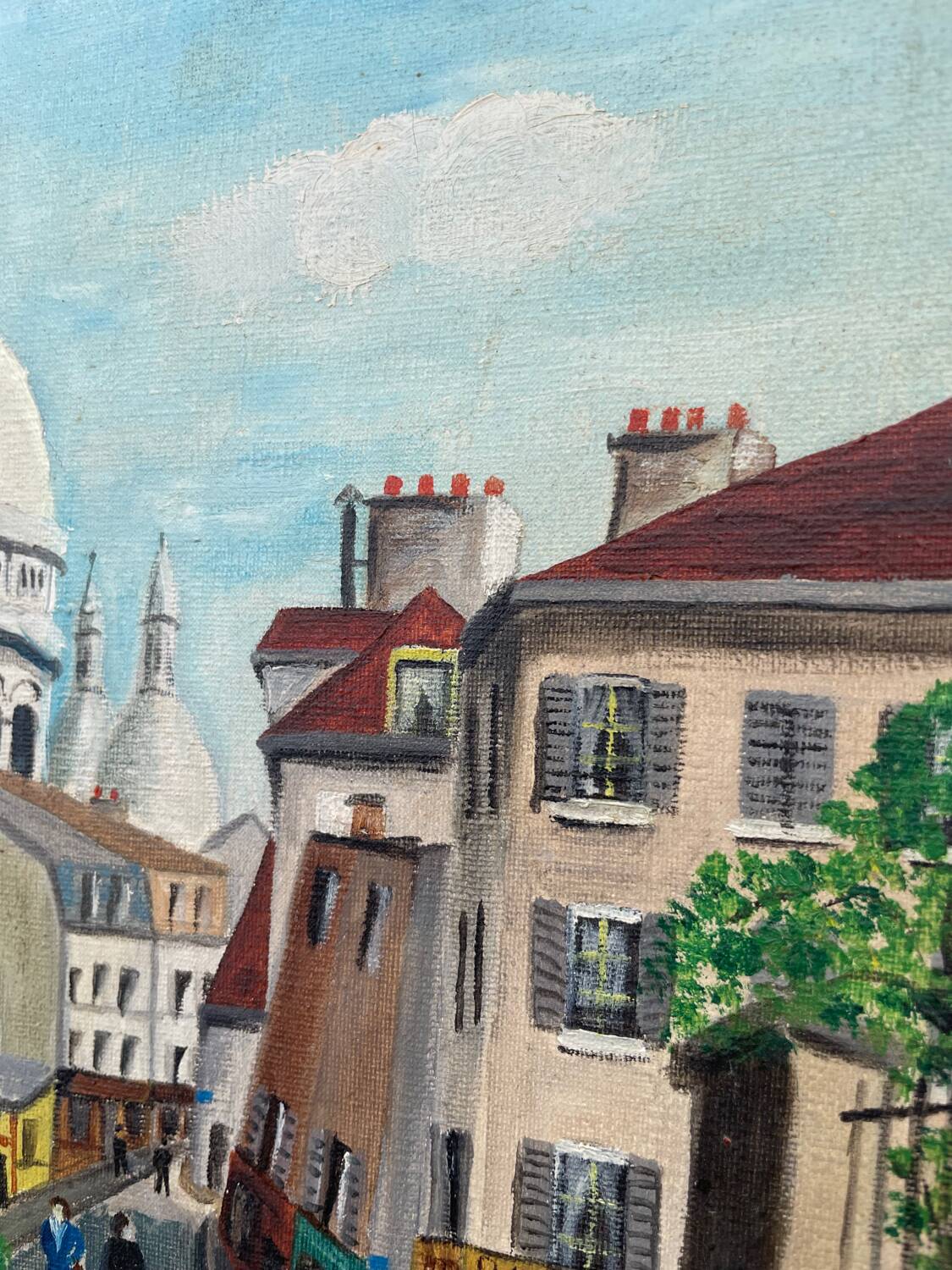 Old oil painting depicting a street in Montmartre