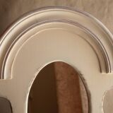 Miroir vintage en bois sculpté.